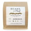 Beans on Park Colombia half caf, light roast coffee in a 12oz kraft bag